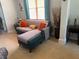 Comfortable living room with a stylish couch, natural light, and modern decor at 3302 Willow Meadow Ln, Douglasville, GA 30135