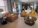 Open-concept living room featuring comfortable seating, natural light, and modern decor at 3302 Willow Meadow Ln, Douglasville, GA 30135