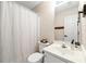 Well-maintained bathroom with toilet, vanity, and shower-tub combination; a practical and clean space at 4210 Hamilton Walk Dr, Buford, GA 30519