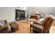 Upstairs living room provides a relaxed area for seating and watching TV with a bedroom area adjacent at 4210 Hamilton Walk Dr, Buford, GA 30519