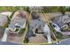 Expansive aerial view of a luxury home, highlighting its elegant design, meticulous landscaping, and desirable neighborhood at 5340 Cole Creek Ln, Cumming, GA 30040