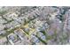 An aerial view showing the layout of the property boundaries within a neighborhood filled with mature trees and landscaped yards at 5340 Cole Creek Ln, Cumming, GA 30040