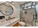 Modern bathroom featuring glass shower, sleek vanity, and stylish fixtures at 5340 Cole Creek Ln, Cumming, GA 30040
