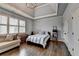 Spacious bedroom features tray ceilings, hardwood floors, and great natural light at 5340 Cole Creek Ln, Cumming, GA 30040