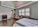 Gorgeous primary bedroom with natural light, trey ceilings, and hardwood floors at 5340 Cole Creek Ln, Cumming, GA 30040