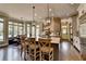 Bright kitchen features a large island with seating and stainless steel appliances at 5340 Cole Creek Ln, Cumming, GA 30040