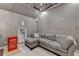Comfortable living area with stylish sectional sofa, Coca-Cola mini fridge and great lighting at 5340 Cole Creek Ln, Cumming, GA 30040