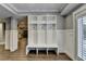 Well-organized mudroom with custom storage cubbies and bench seating at 5340 Cole Creek Ln, Cumming, GA 30040