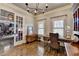 Comfortable office space with hardwood floors, natural light, and French doors at 5340 Cole Creek Ln, Cumming, GA 30040