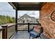 Covered patio with view of the home at 5340 Cole Creek Ln, Cumming, GA 30040