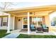 Welcoming front porch featuring cozy seating, perfect for relaxing and enjoying the outdoors at 885 Green Valley Dr Nw, Conyers, GA 30012