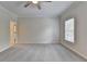 Bright bedroom features plush carpeting, neutral walls, and window with blinds at 2110 Se Murren Se Dr, Smyrna, GA 30080