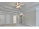 Spacious bedroom features tray ceilings and multiple doorways for convenience at 2110 Se Murren Se Dr, Smyrna, GA 30080