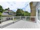 Back deck overlooking landscaped yard and neighboring houses at 2110 Se Murren Se Dr, Smyrna, GA 30080