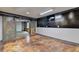 The garage is accessible from the house via sliding metal doors and has a mounted TV at 2110 Se Murren Se Dr, Smyrna, GA 30080