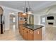 Open kitchen flowing to living space with hardwood floors and granite countertops at 2110 Se Murren Se Dr, Smyrna, GA 30080