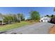 View of the backyard with an outbuilding and an in-ground pool at 281 Chilhoe Dr, Canton, GA 30115