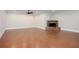 Finished basement with a fireplace and concrete floors, providing ample space at 281 Chilhoe Dr, Canton, GA 30115