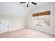 Bedroom with window, carpet, and ceiling fan at 281 Chilhoe Dr, Canton, GA 30115