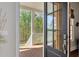 A grand entrance awaits with a stylish door and scenic outdoor views at 281 Chilhoe Dr, Canton, GA 30115
