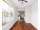 Empty living room with hardwood floors and a bright view of the kitchen at 281 Chilhoe Dr, Canton, GA 30115