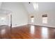 Open living room with hardwood floors, great light, and high ceilings at 281 Chilhoe Dr, Canton, GA 30115