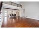 Spacious living room with hardwood floors and a kitchen featuring a large island at 281 Chilhoe Dr, Canton, GA 30115