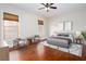 Bedroom with hardwood floors, seating, and a stylish rug at 281 Chilhoe Dr, Canton, GA 30115