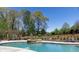 Relaxing backyard pool with a spa and plenty of space for lounging at 281 Chilhoe Dr, Canton, GA 30115