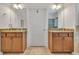 Dual sink vanities with granite countertops provide ample space in this modern bathroom at 498 Townsend St, Grayson, GA 30017