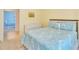 View of a bedroom featuring carpet, a plush bed, and view to adjacent room at 498 Townsend St, Grayson, GA 30017
