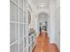 Bright hallway with hardwood floors and decorative accents, showcasing the home's interior at 498 Townsend St, Grayson, GA 30017