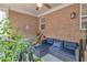 Enclosed sunroom features a comfortable seating area for relaxation and enjoyment at 498 Townsend St, Grayson, GA 30017
