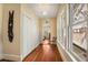 Hallway featuring a row of windows with natural light and hardwood floors at 1290 Oxford Ne Rd, Atlanta, GA 30306