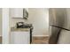 The updated kitchen features stainless steel appliances and granite countertops at 1542 Columbia Dr, Decatur, GA 30032