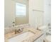 Bathroom featuring granite vanity and a window at 1908 Sailcloth St, Lithonia, GA 30058