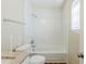 Full bathroom with a shower-tub combination and granite vanity at 1908 Sailcloth St, Lithonia, GA 30058