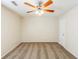 Cozy bedroom with plush carpet and a ceiling fan at 1908 Sailcloth St, Lithonia, GA 30058