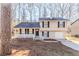 Charming two-story home with a cozy front porch and well-maintained front yard at 1908 Sailcloth St, Lithonia, GA 30058