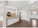 A large kitchen features granite countertops, stainless appliances, and tile backsplash at 2785 Maple Park Pl, Cumming, GA 30041