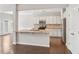 The kitchen is outfitted with granite counters, stainless appliances, and a breakfast bar at 2785 Maple Park Pl, Cumming, GA 30041