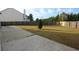 Large backyard space surrounded by a wooden fence, showcasing a serene outdoor environment at 838 Roxholly Ln, Buford, GA 30518