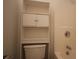 Bathroom featuring toilet with a cabinet system and a shower at 838 Roxholly Ln, Buford, GA 30518