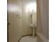 Bathroom with a pedestal sink and a curved shower curtain rod at 838 Roxholly Ln, Buford, GA 30518