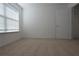 Bedroom with plush carpet and ample natural light at 838 Roxholly Ln, Buford, GA 30518