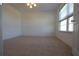 Light and airy bedroom with large window allowing natural light to illuminate the space at 838 Roxholly Ln, Buford, GA 30518