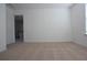 Bright, carpeted bedroom featuring neutral walls and natural light at 838 Roxholly Ln, Buford, GA 30518