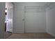 Bedroom walk-in closet with wire shelving, carpet and open door at 838 Roxholly Ln, Buford, GA 30518