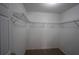 Spacious walk-in closet with wire shelving and carpeting at 838 Roxholly Ln, Buford, GA 30518