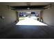 Spacious garage with overhead door showcases the neighborhood's well-maintained exterior views at 838 Roxholly Ln, Buford, GA 30518